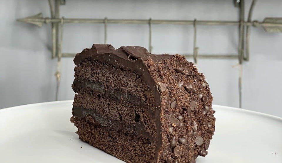 Order Chocolate Cake - Dessert food online from Troys Italian Kitchen store, Arlington on bringmethat.com