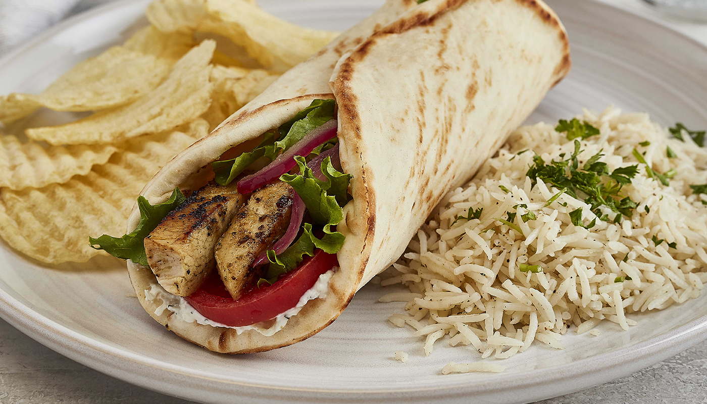Order Grilled Chicken Gyro food online from Taziki Mediterranean Café store, Knoxville on bringmethat.com