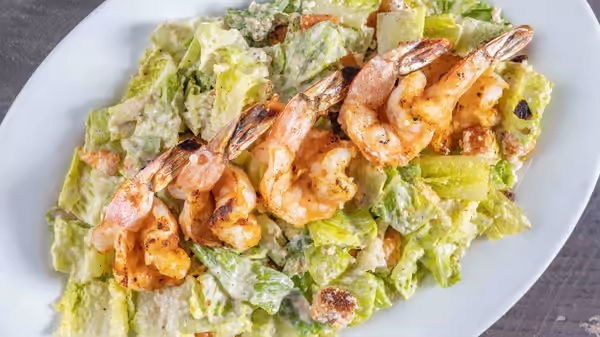 Order Caesar Salad with Grilled Shrimp food online from T.J. Byrnes store, New York on bringmethat.com