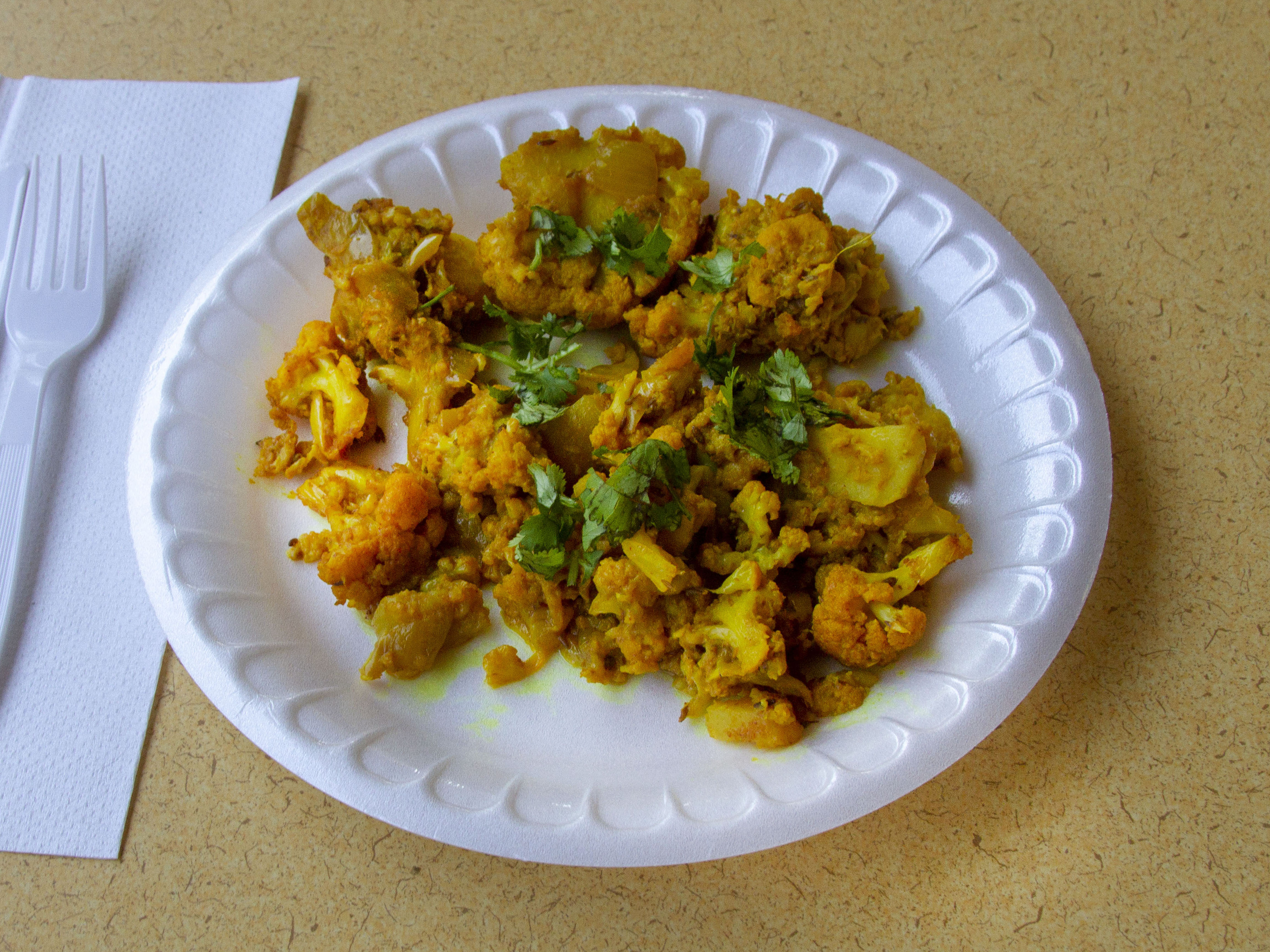 Order Aloo Gobhi food online from Samosa Hut And Spices store, Fresno on bringmethat.com