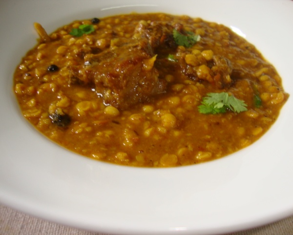 Order Lamb Dal food online from Indian Domino's Pizza store, San Francisco on bringmethat.com