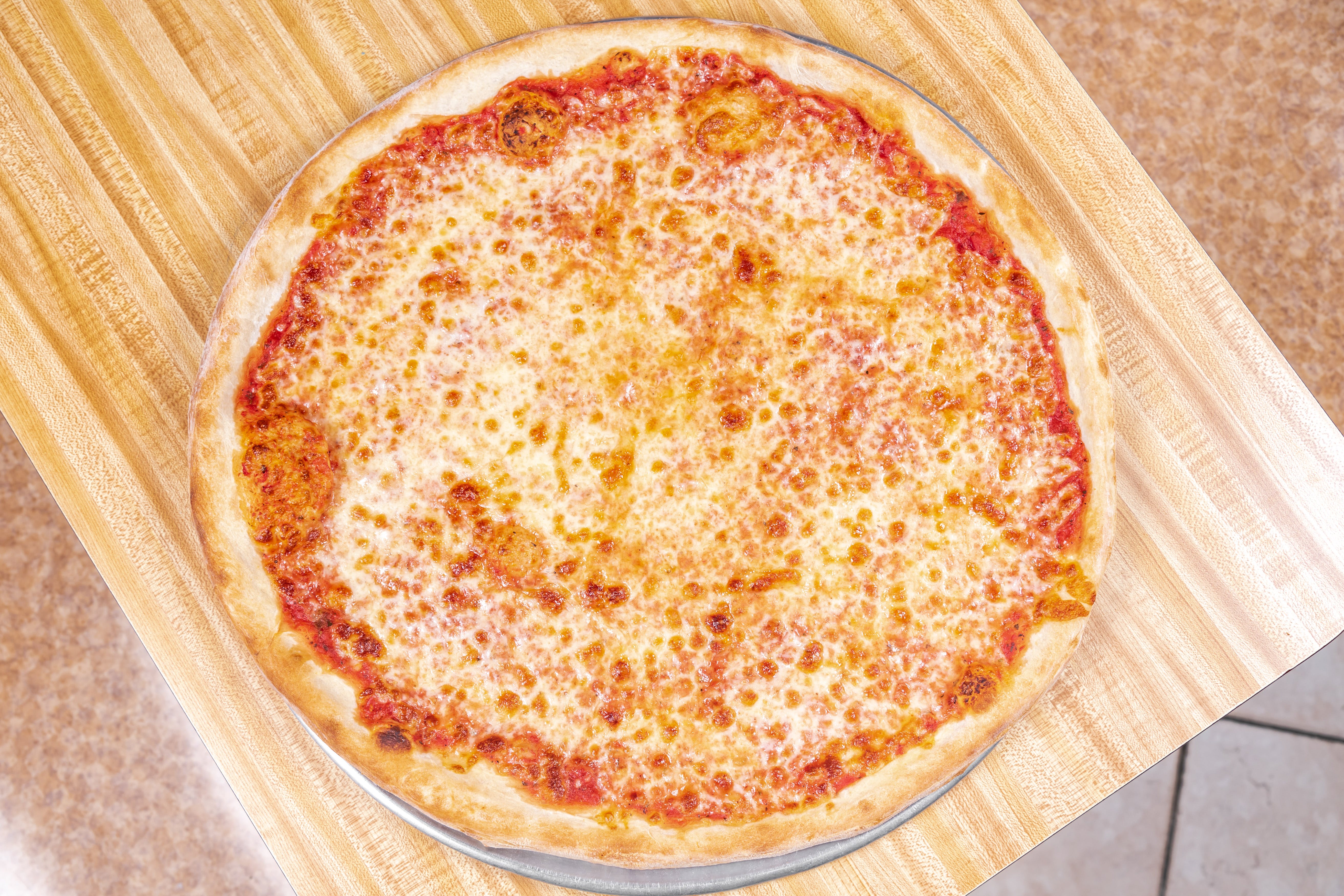 Order Plain Cheese Pizza - Personal food online from Riuniti Pizzeria & Restaurant store, Carteret on bringmethat.com
