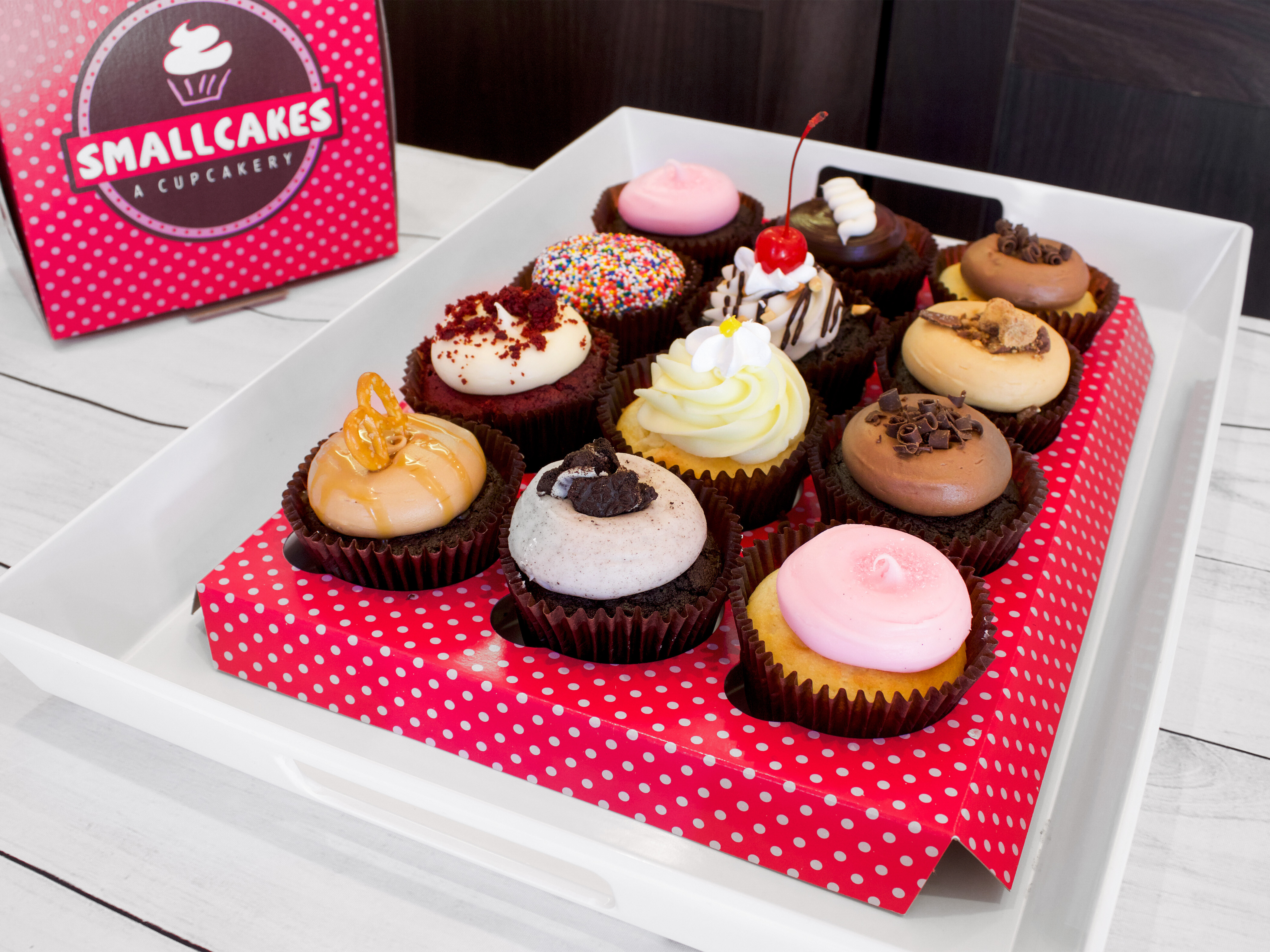 Order Box of 12 Assorted  Cupcakes food online from Smallcakes Cupcakery & Creamery store, Danville on bringmethat.com