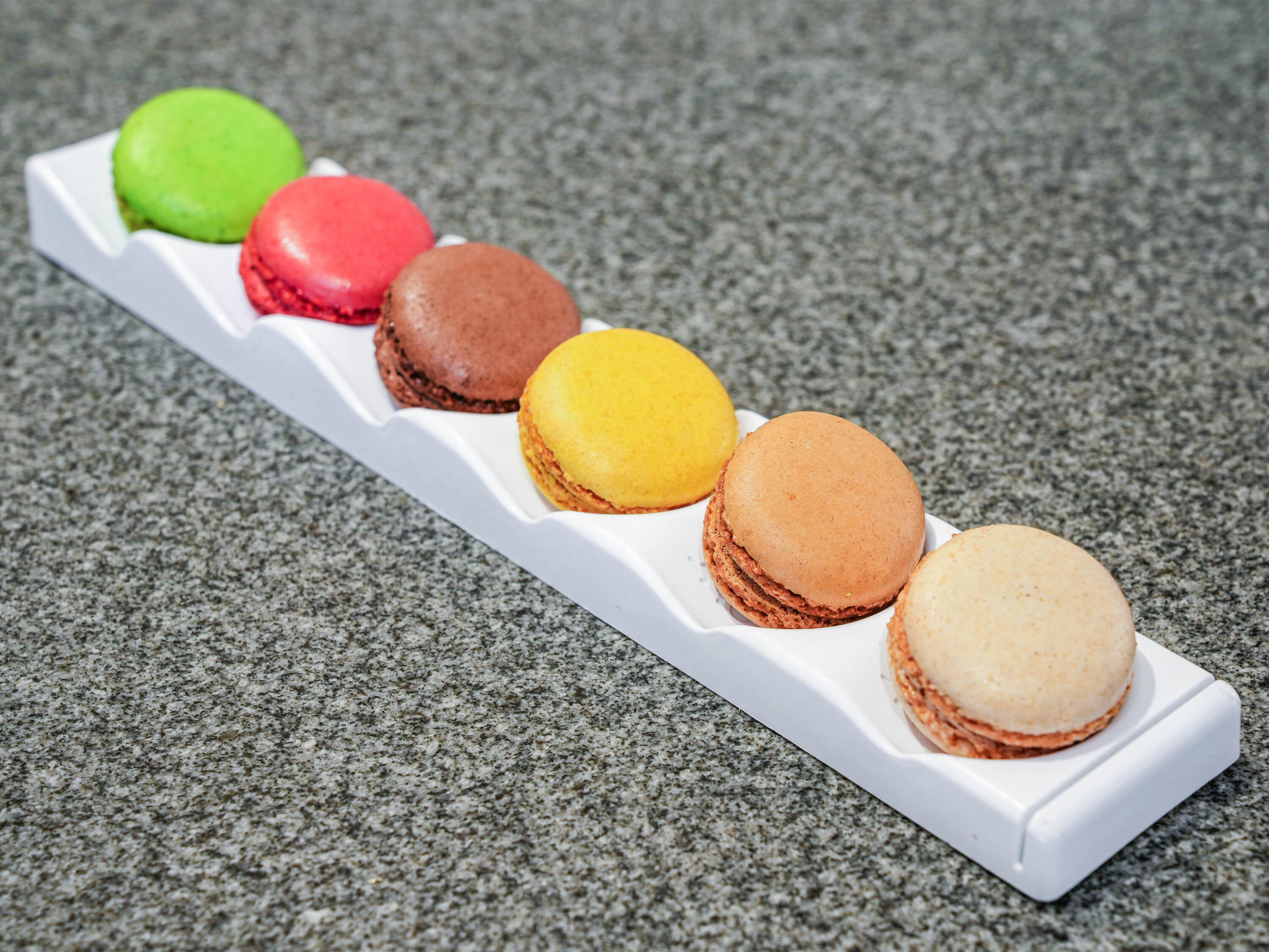 Order French Macaron  food online from Sweet Art Cafe store, Orange on bringmethat.com