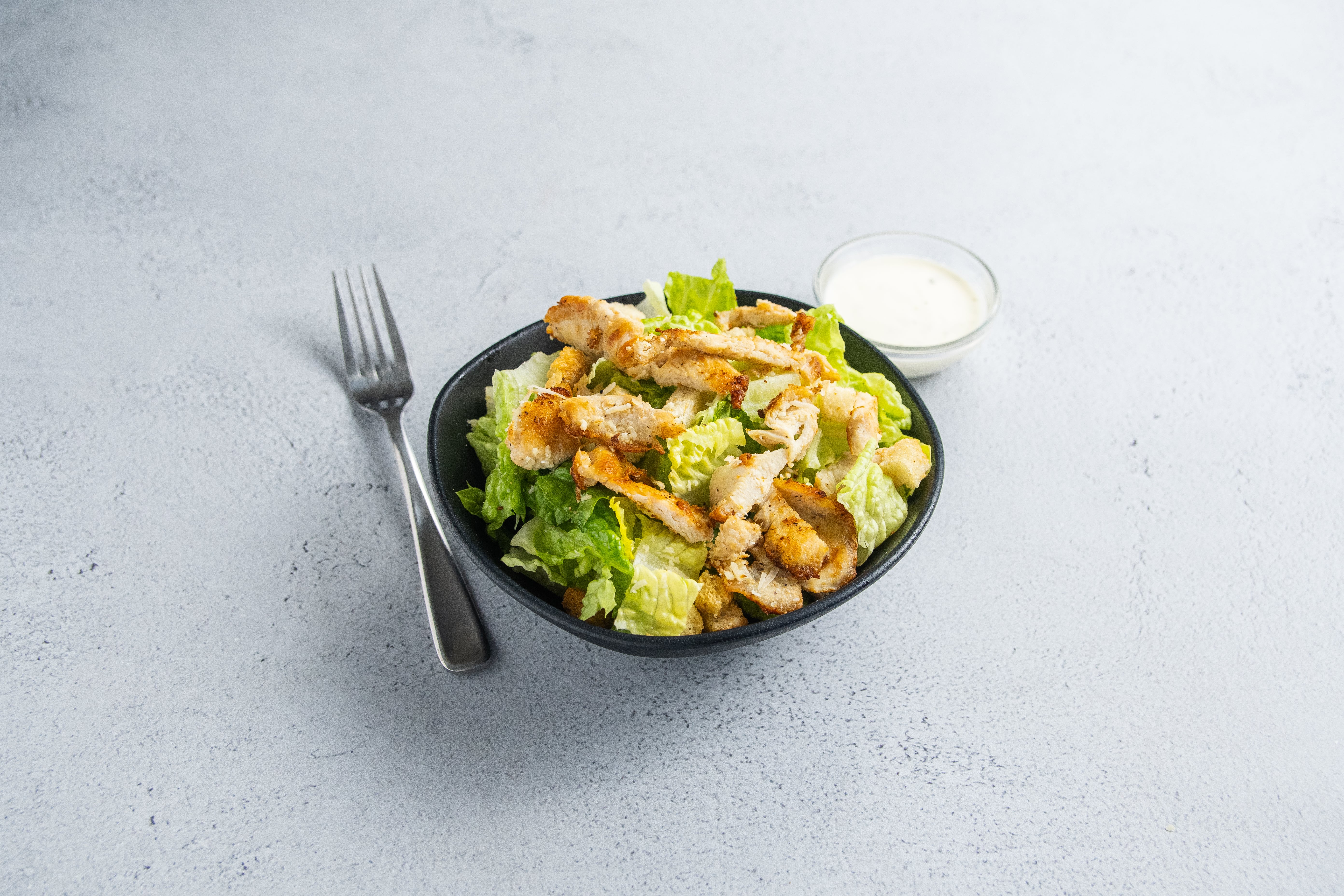 Order 80. Chicken Caesar Salad food online from Palermo's Pizza store, Hawthorne on bringmethat.com