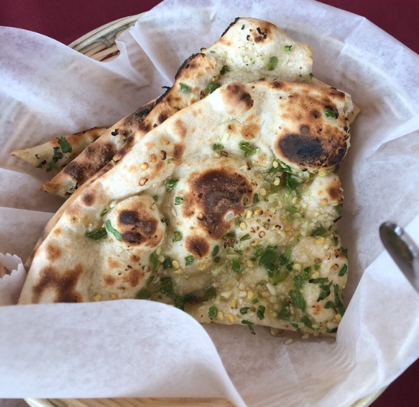 Order Garlic Naan food online from Bombay Nights store, Perry Hall on bringmethat.com