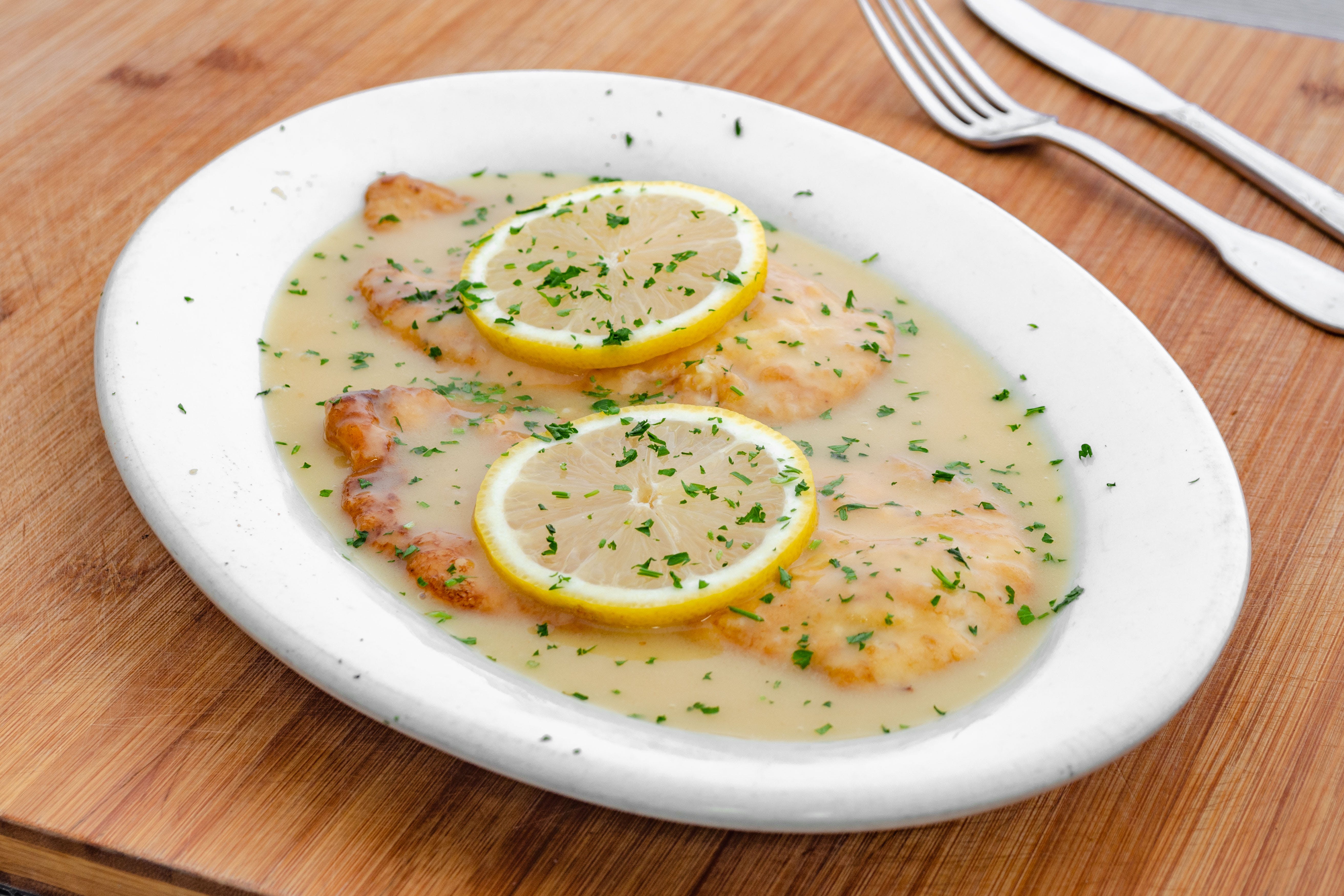Order Chicken Francese - Entree food online from Maria Pizza store, Yorktown Heights on bringmethat.com