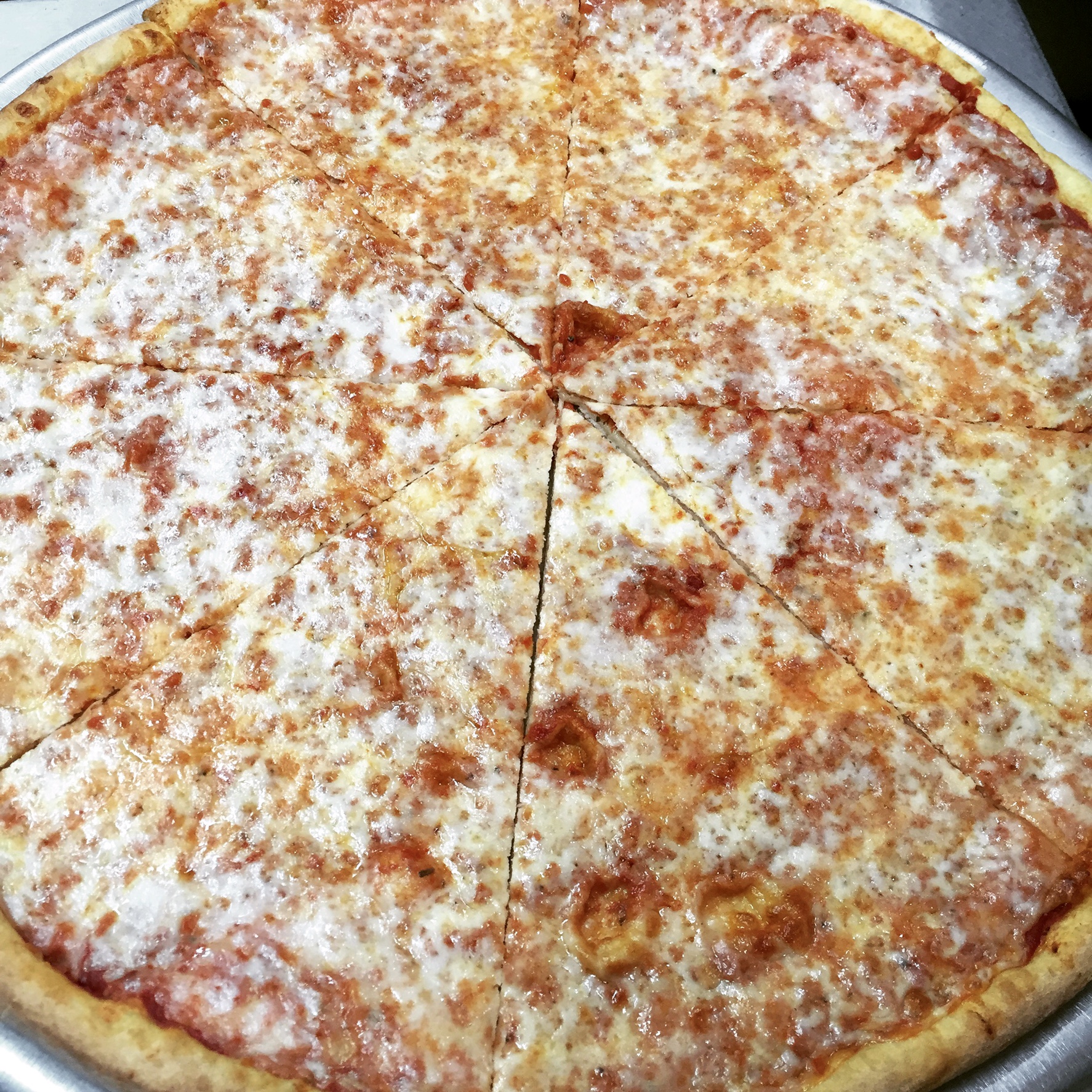 Order Regular Pizza Slice food online from Vinny's Pizzeria store, Corona on bringmethat.com