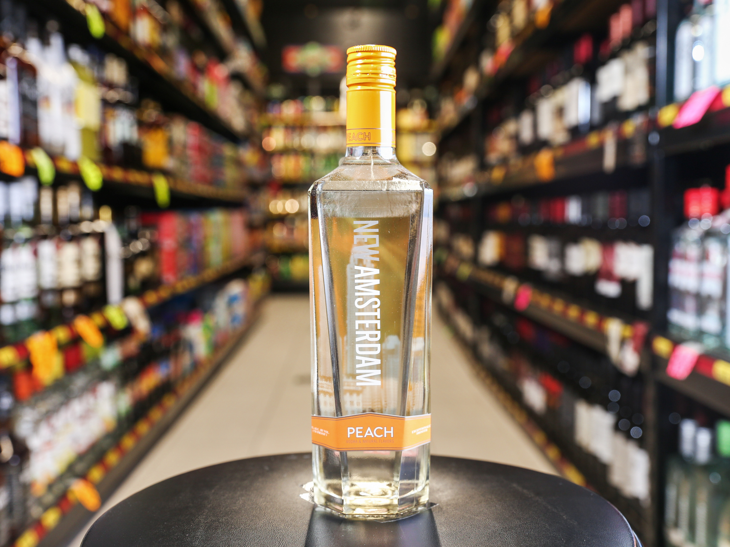 Order New Amsterdam Peach Flavored, 750ml Vodka (35.0% ABV) food online from Gold Crown Liquors store, Chicago on bringmethat.com