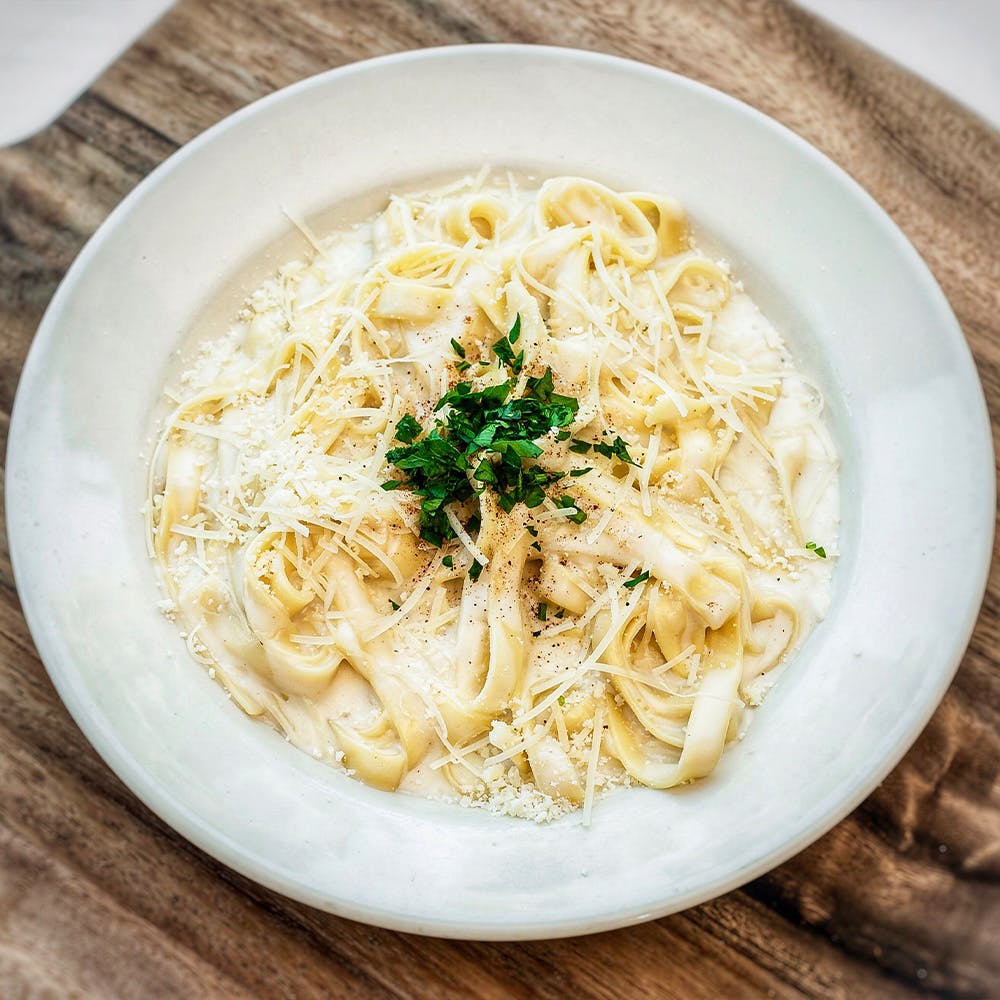 Order Fettucine Alfredo - Small food online from Amici's East Coast Pizzeria store, Vacaville on bringmethat.com