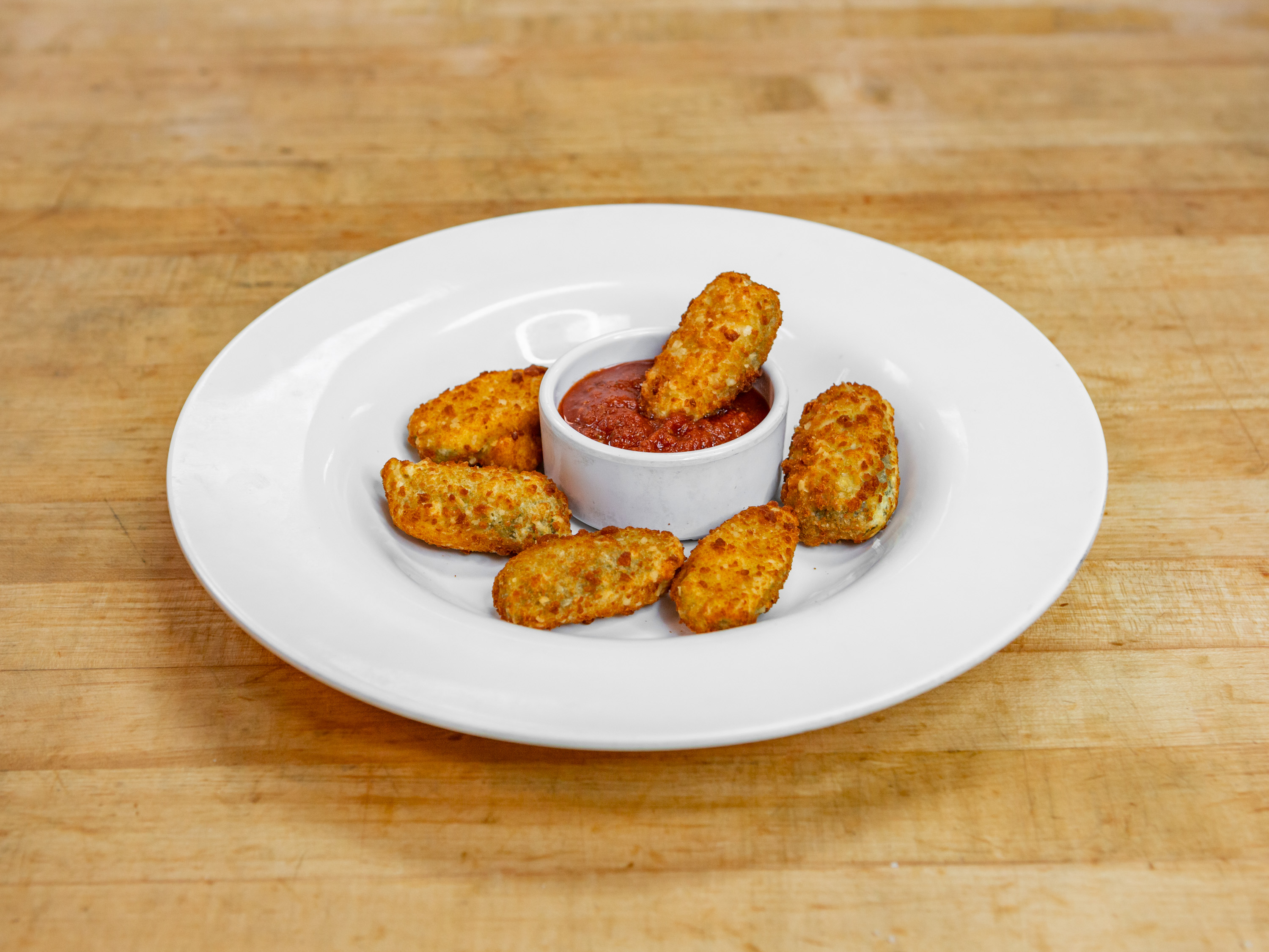 Order Jalapeno Poppers food online from Guidos Pizza store, Anchorage on bringmethat.com