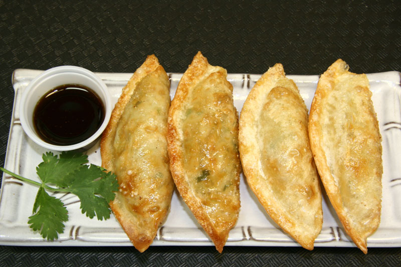 Order Gyoza (6pc) food online from Pacific Restaurant store, Huntington Park on bringmethat.com