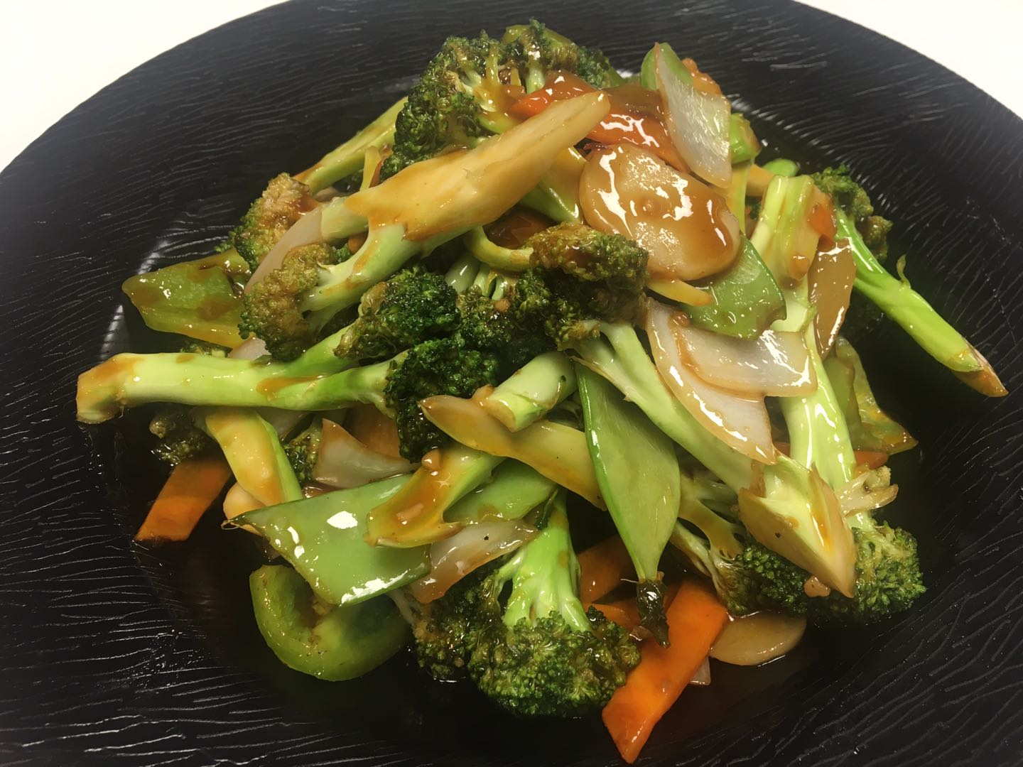 Order 81. Broccoli with Garlic Sauce food online from Mandarin Chinese Cuisine store, Covina on bringmethat.com