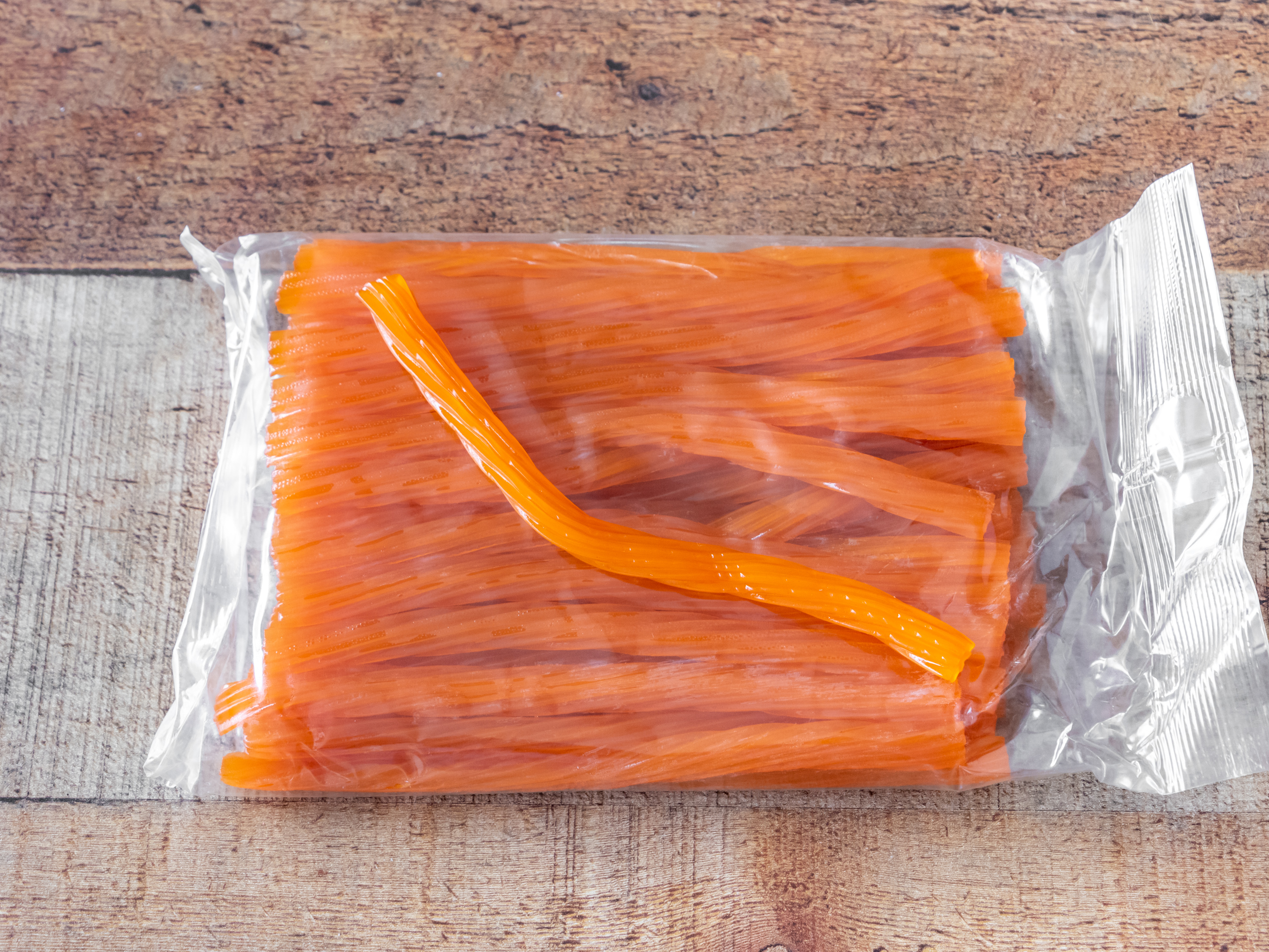 Order 1 lb orange licorice  food online from The Peppermint Stick Candy Store store, Boyertown on bringmethat.com