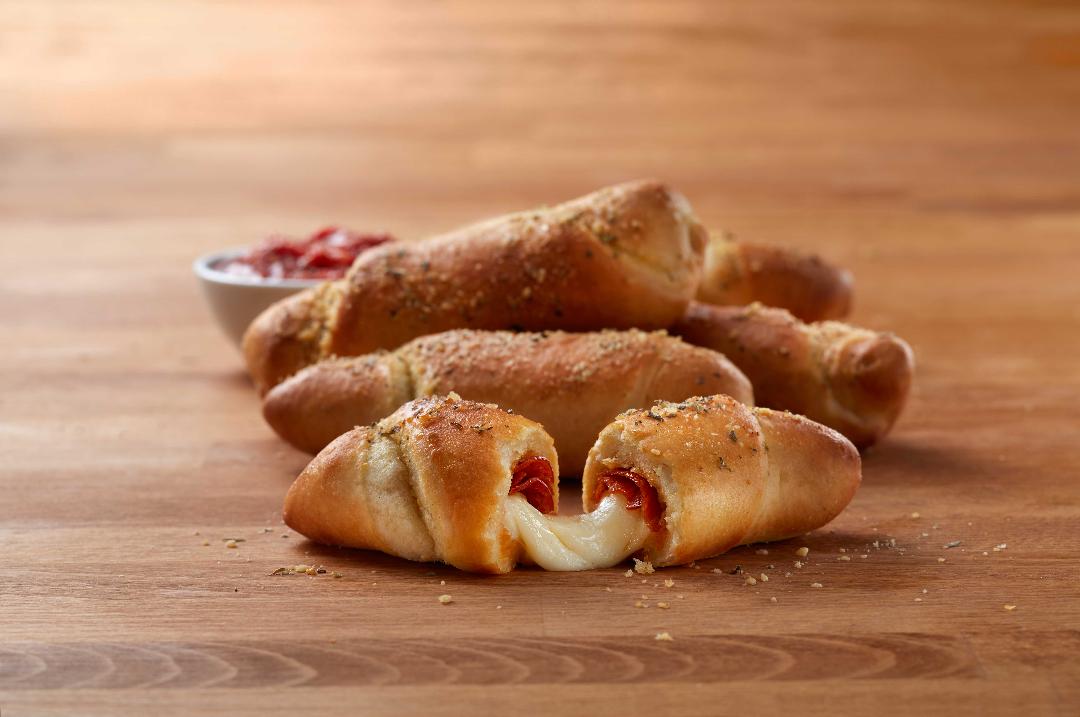 Order 6 Piece Pepperoni Twist food online from Pizza Inn store, Mesquite on bringmethat.com