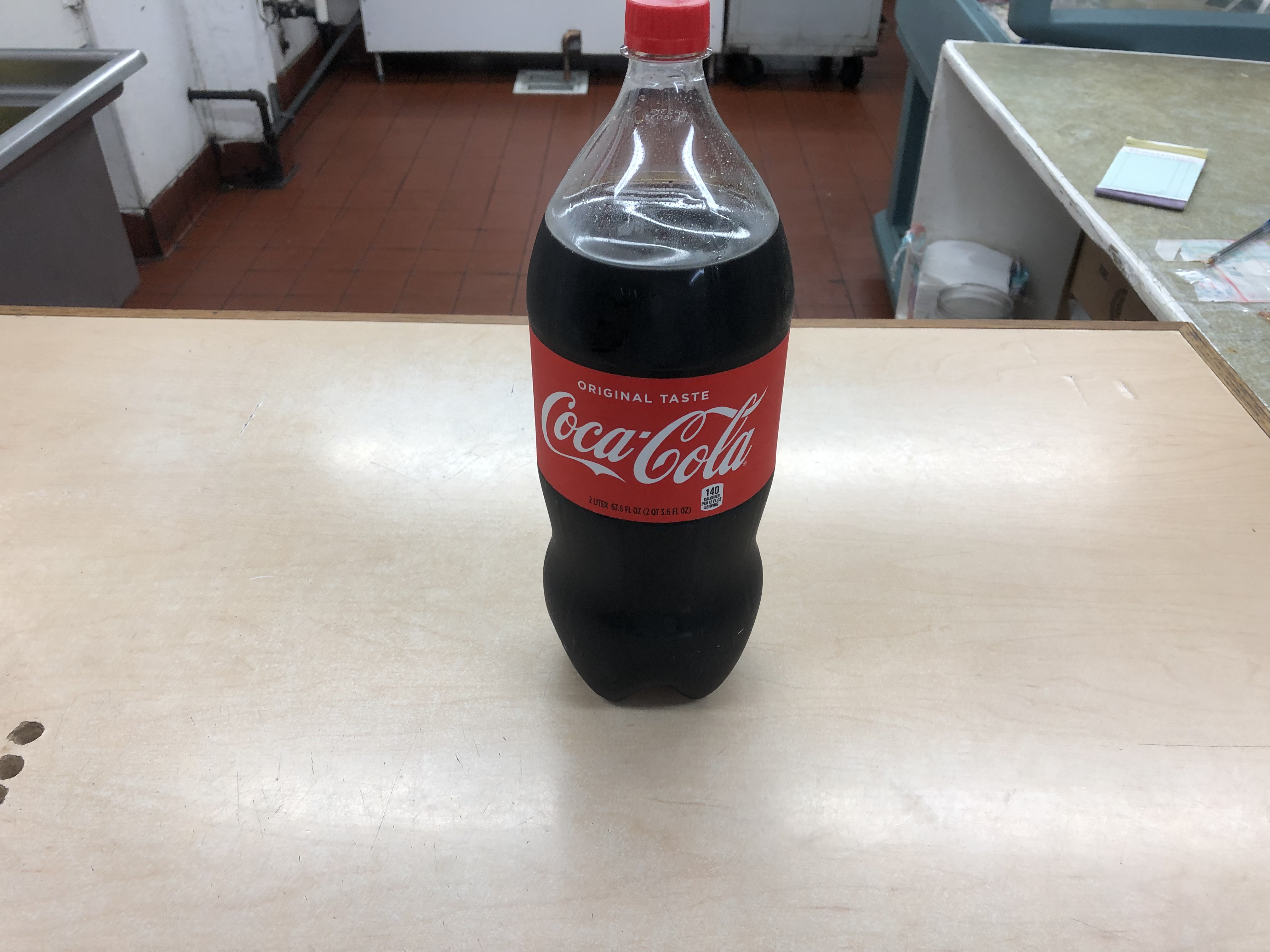 Order 2 Liter Coke Cola food online from Taco Azteca store, Corona on bringmethat.com