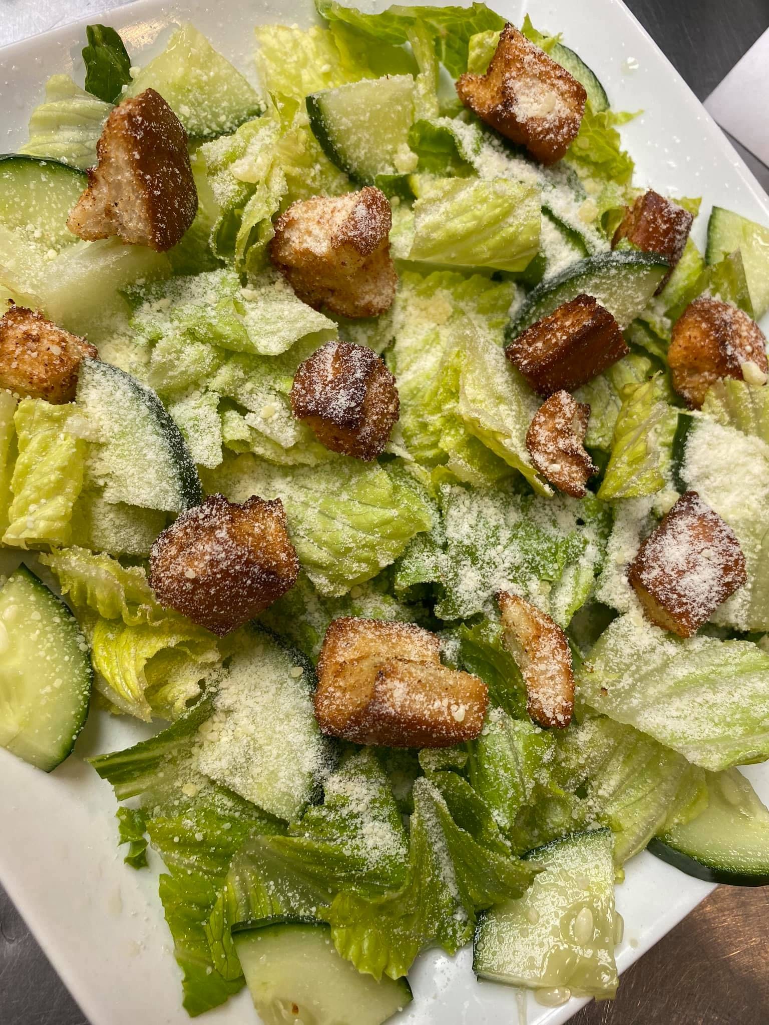 Order Caesar Salad - Regular food online from Primo Pizza store, Fredericksburg on bringmethat.com