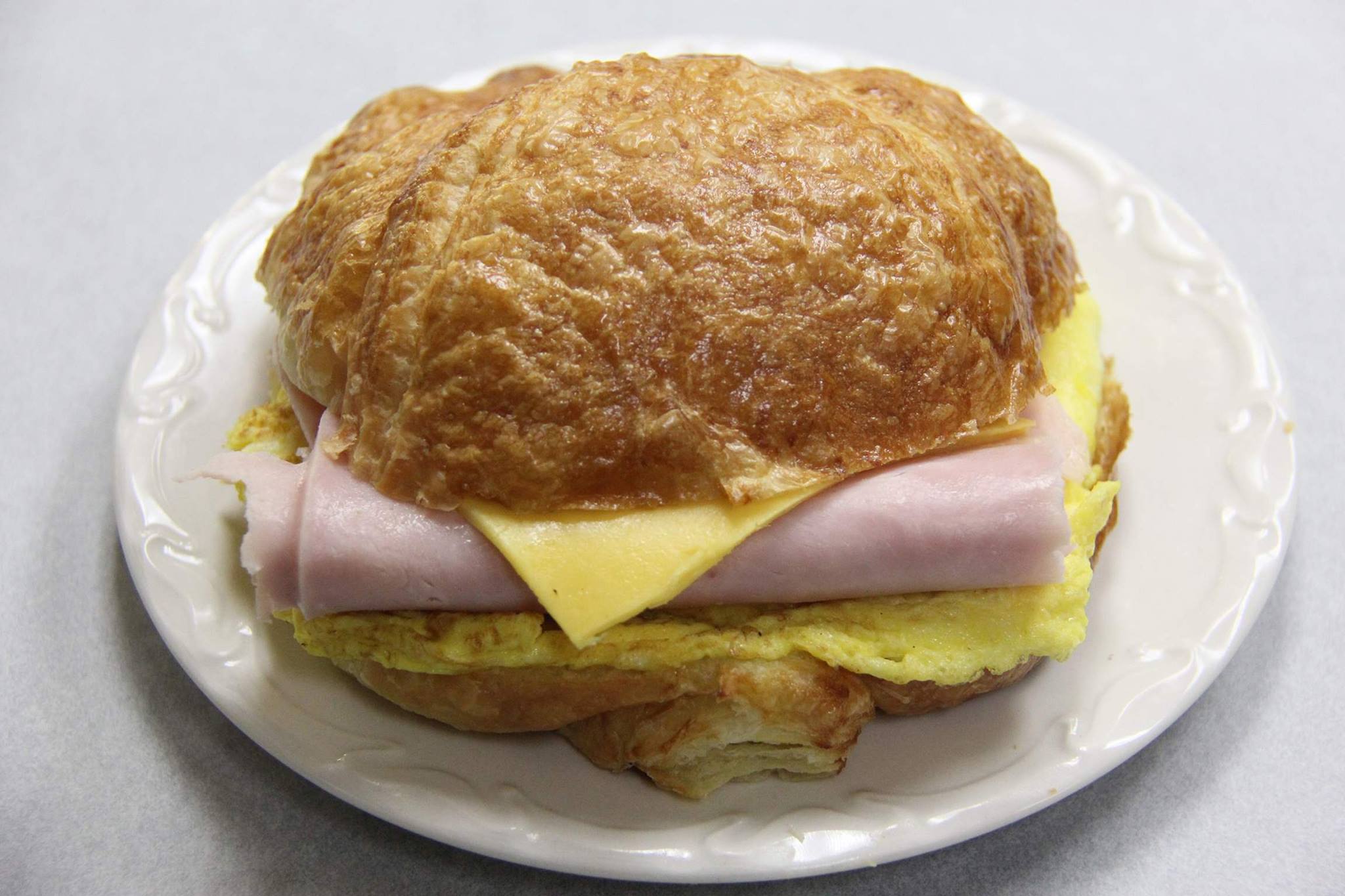 Order Egg and Cheese on Croissant food online from Happy Donut store, San Francisco on bringmethat.com