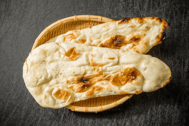 Order Plain Naan food online from Sunlight Indian Cuisine store, Ceres on bringmethat.com
