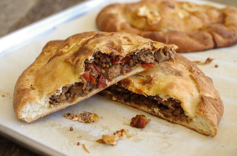 Order Meat Calzone - Calzone food online from Yaya Pizza store, Upland on bringmethat.com