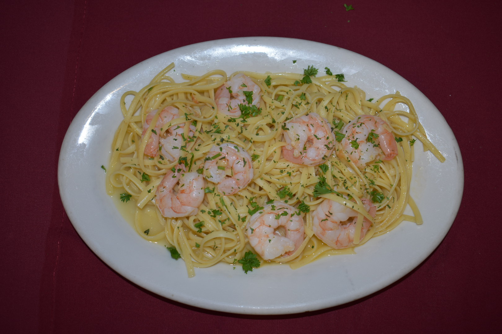 Order Linguini with Garlic Shrimp food online from Como's No 1 Italian Restaurant store, El Paso on bringmethat.com