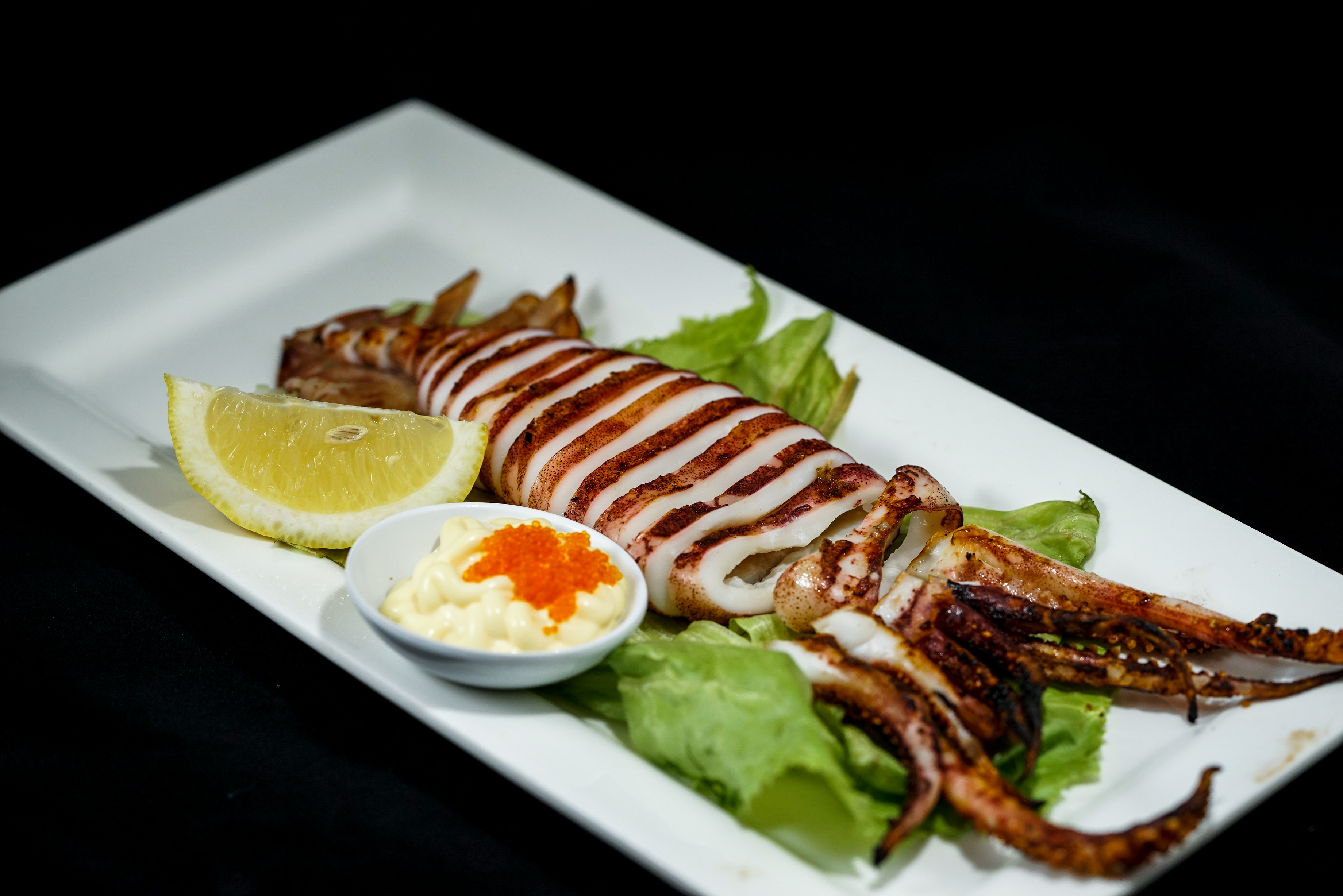Order Grilled Ika food online from Go Sushi Japanese Restaurant store, Pacifica on bringmethat.com