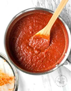 Order side meat sauce food online from Zorbas Fine Greek Cuisine store, Albuquerque on bringmethat.com
