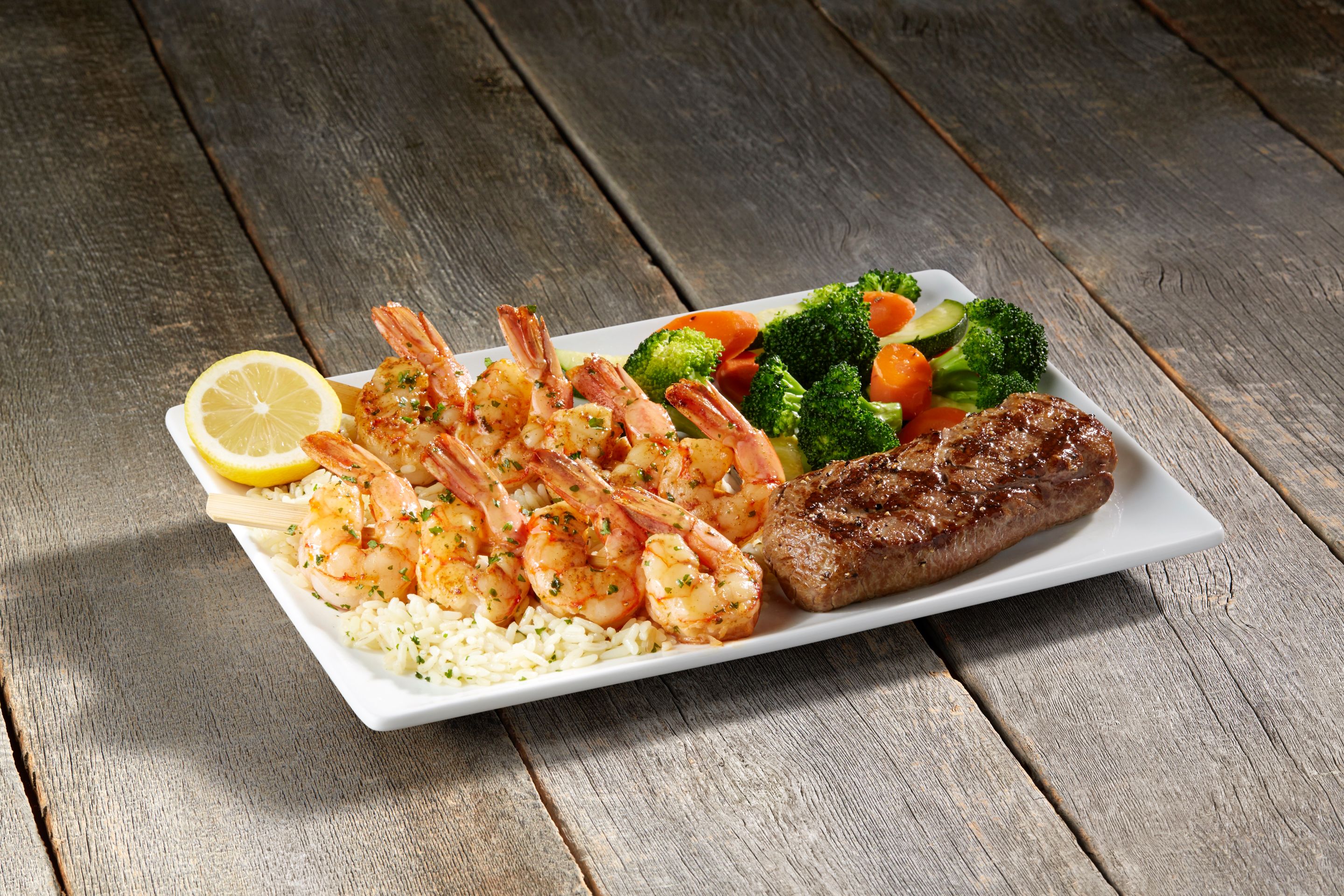 Order Steak & Grilled Shrimp Skewers food online from Sizzler store, Downey on bringmethat.com