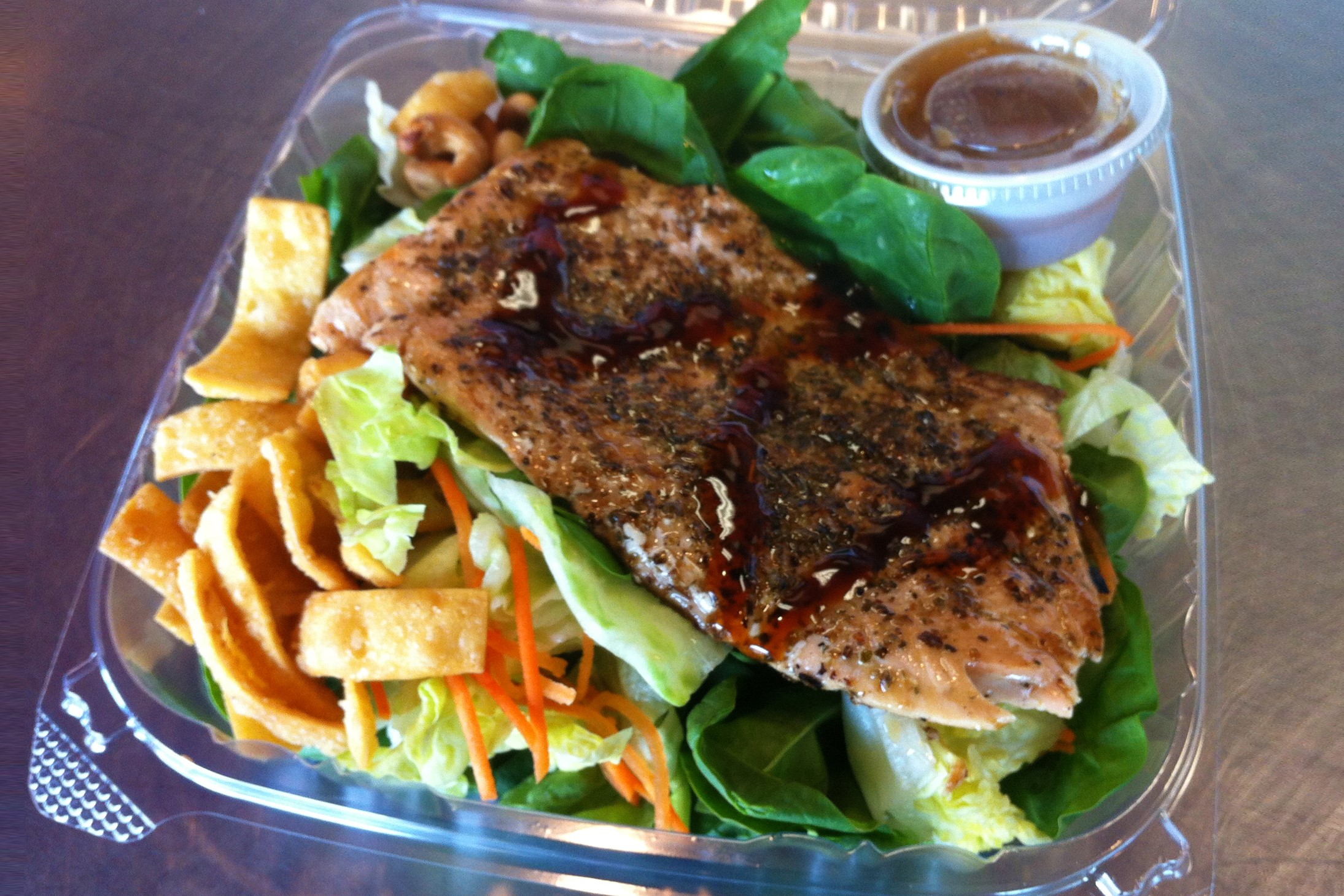 Order Grilled Teriyaki Salmon Salad food online from Bamboo Bistro store, Austin on bringmethat.com
