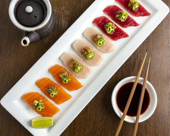 Order Trio of Salmon, Tuna, and Yellowtail Sashimi food online from Tao Night Club store, Las Vegas on bringmethat.com