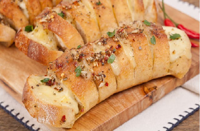 Order Garlic Bread with Mozzarella Cheese - Appetizer food online from House Of Pizza store, Pennsauken Township on bringmethat.com