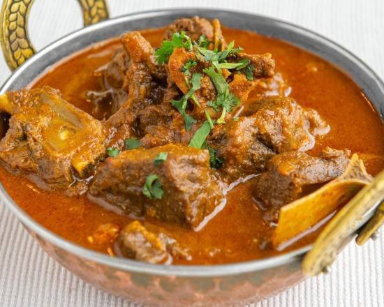 Order Goat Curry food online from Pure Indian Cuisine store, Las Vegas on bringmethat.com