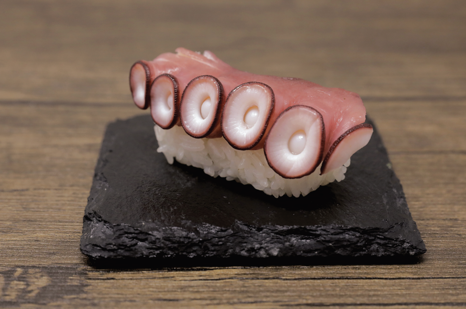 Order Octopus (Tako) food online from Asahi Sushi store, Granada Hills on bringmethat.com