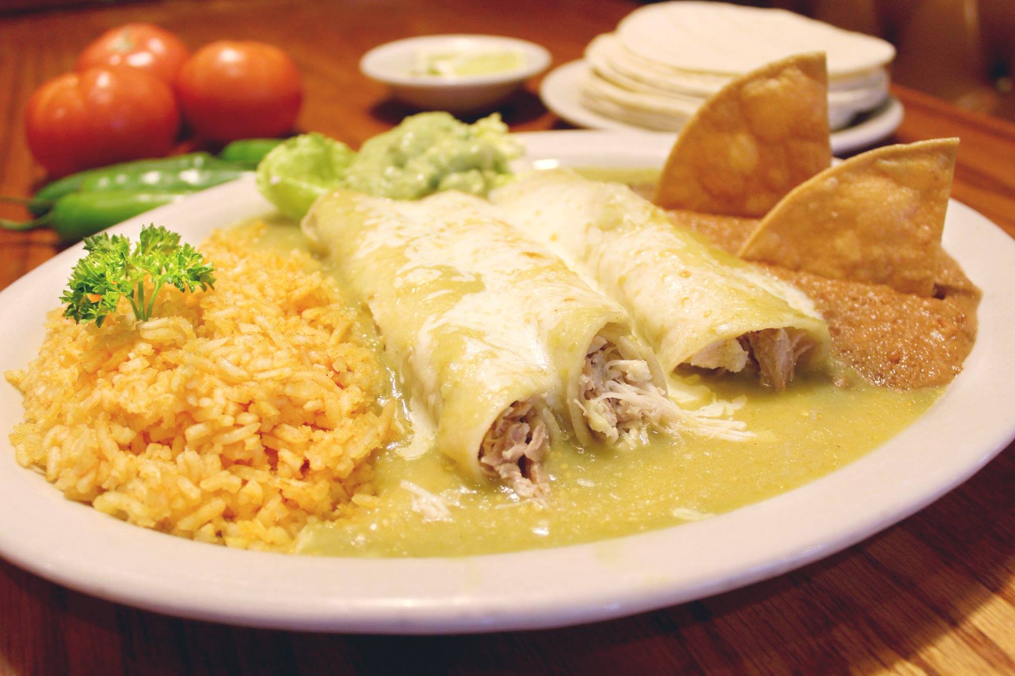 Order Enchiladas Suizas (3) food online from Danny Restaurant store, Laredo on bringmethat.com