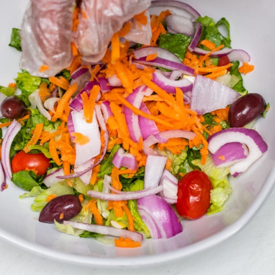 Order Tossed Salad - Small food online from Crossroads Pizza store, Bridgeport on bringmethat.com