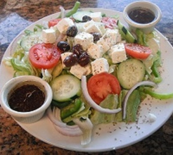 Order Greek Salad food online from Zorbas Pizza store, Millbrae on bringmethat.com