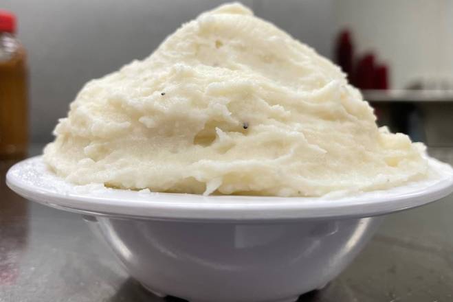 Order Mashed Potatoes with Gravy food online from Dunderbak's Market Cafe store, Fullerton on bringmethat.com