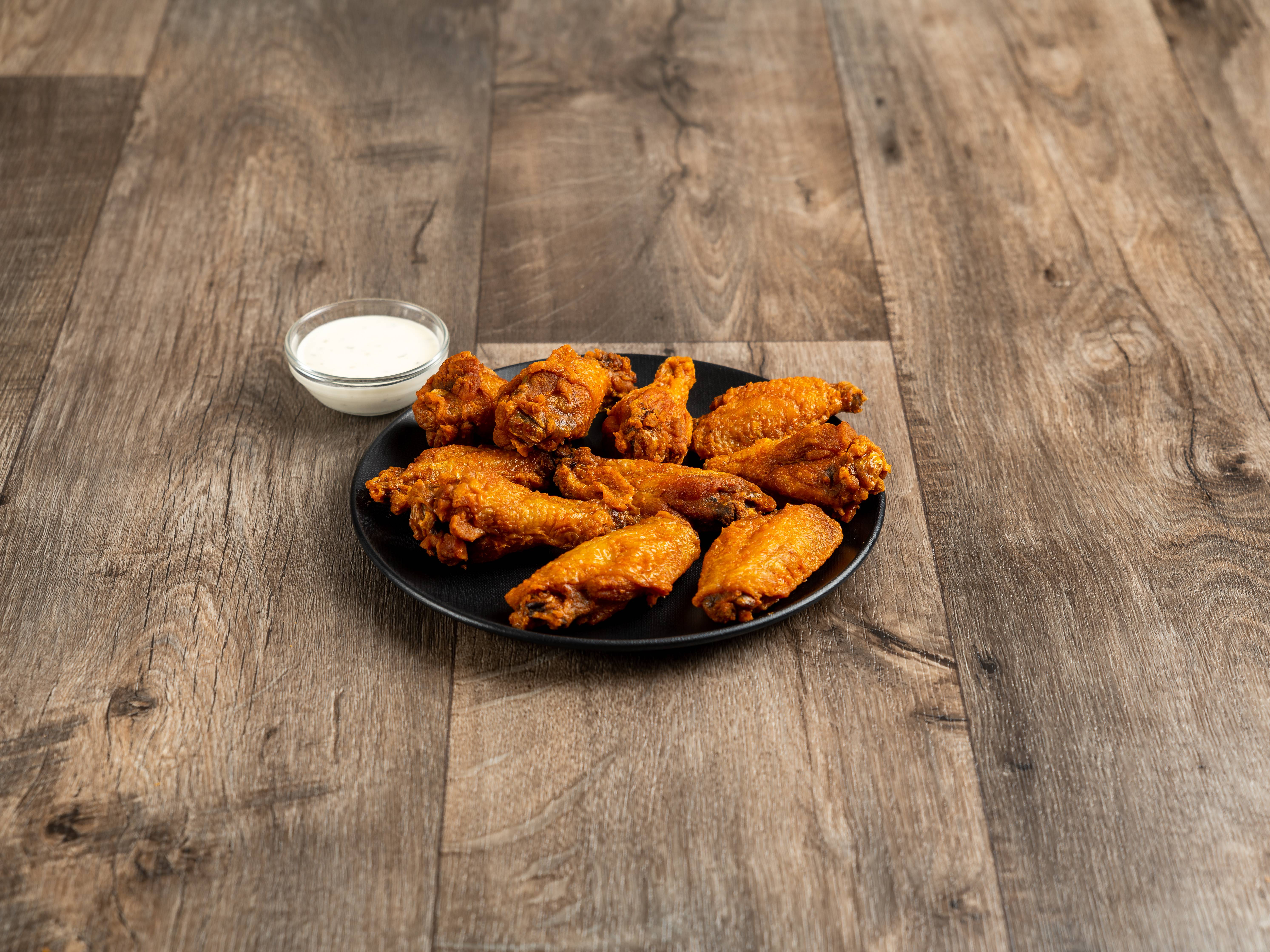 Order 12 Wings food online from Scotty Quixx store, Virginia Beach on bringmethat.com