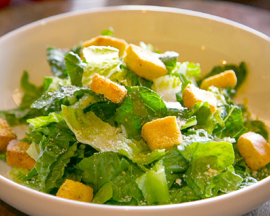 Order Caesar Salad food online from Russo's New York Pizzeria store, Houston on bringmethat.com