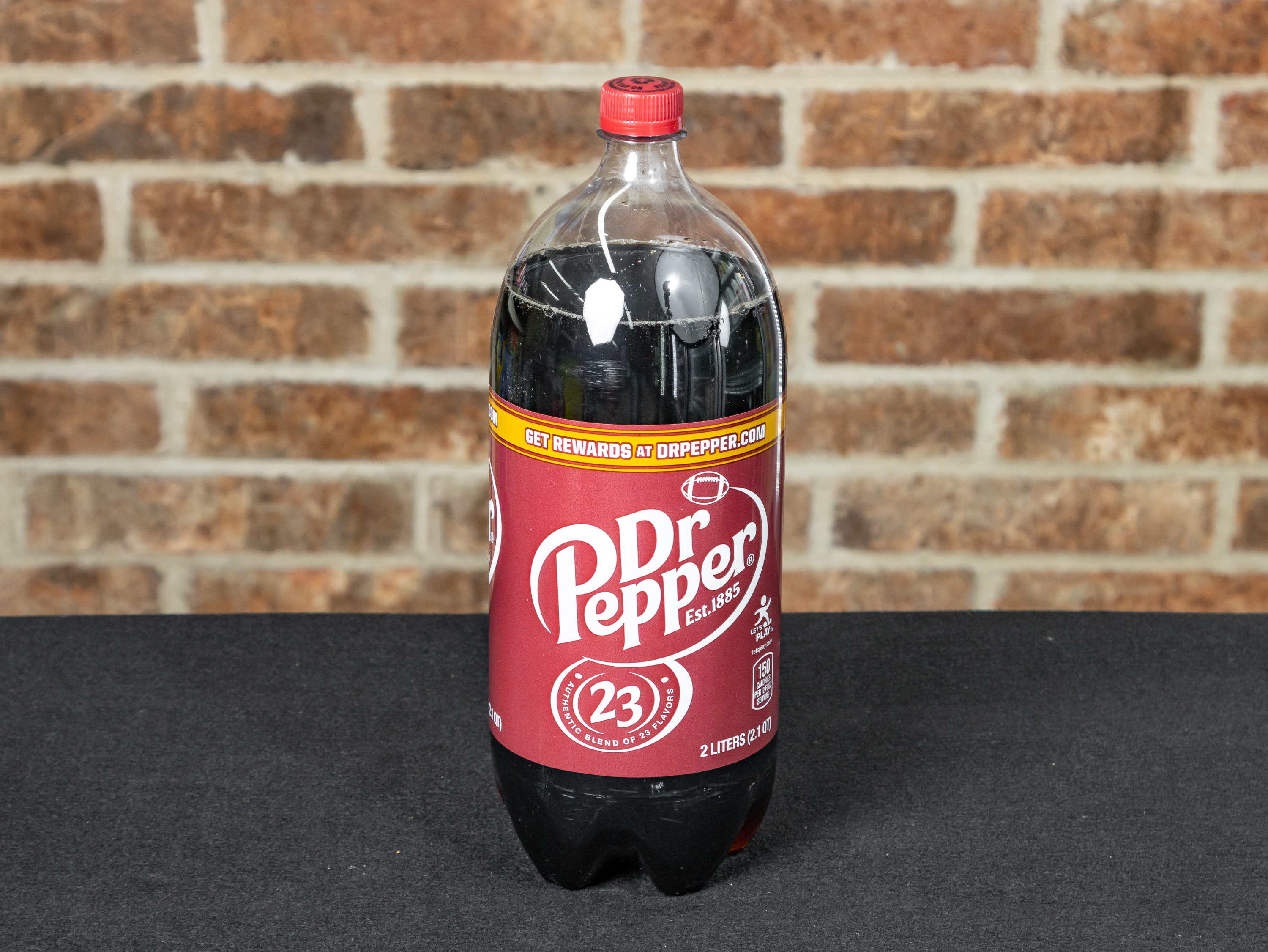 Order 2 Liter Dr Pepper food online from Handy Mart store, Mckinney on bringmethat.com