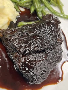 Order Slow Braised Short Ribs food online from Bistro 1051 store, Clark on bringmethat.com