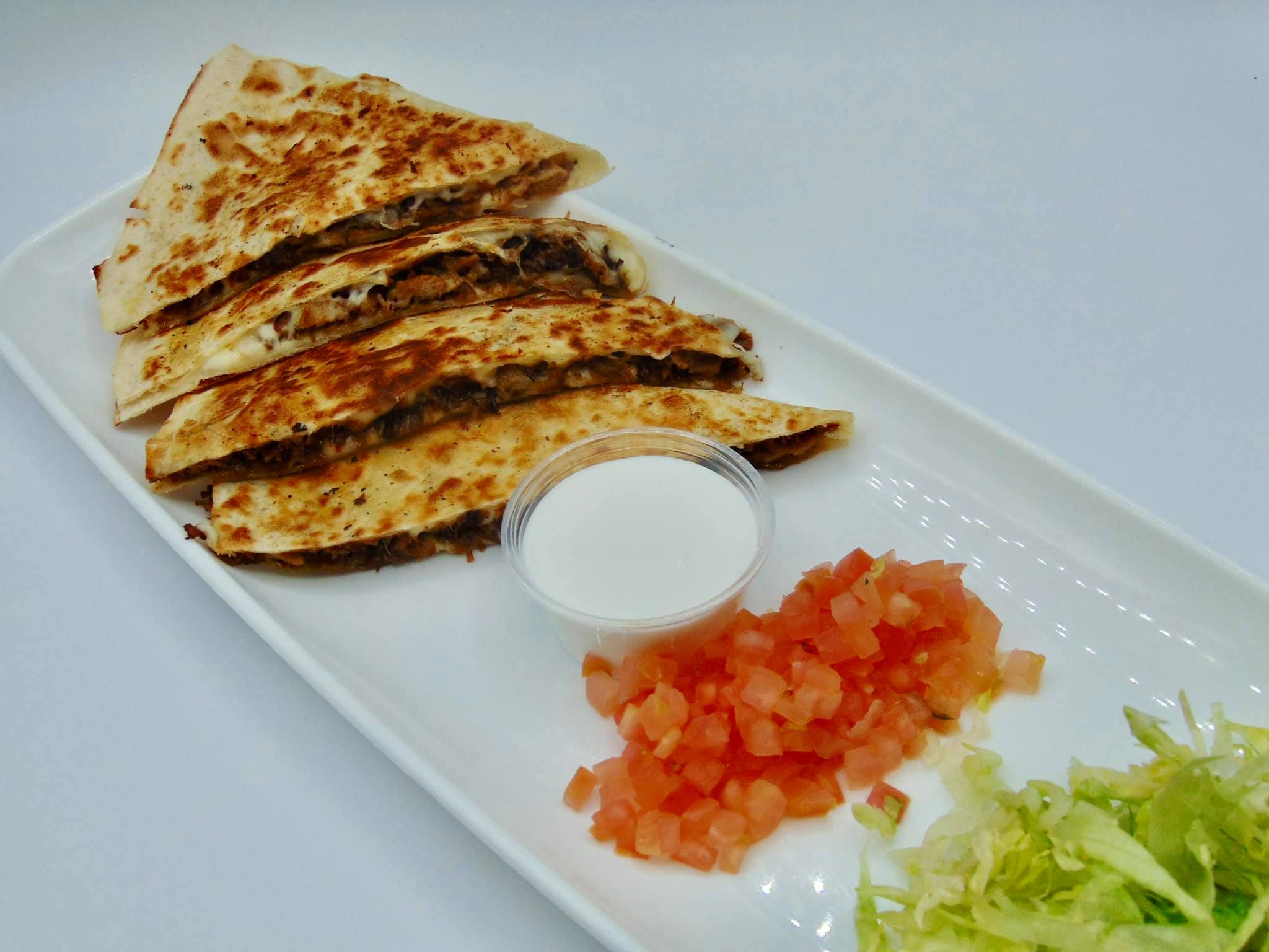 Order Quesadilla food online from Chicago Style Taco Shop store, Lombard on bringmethat.com