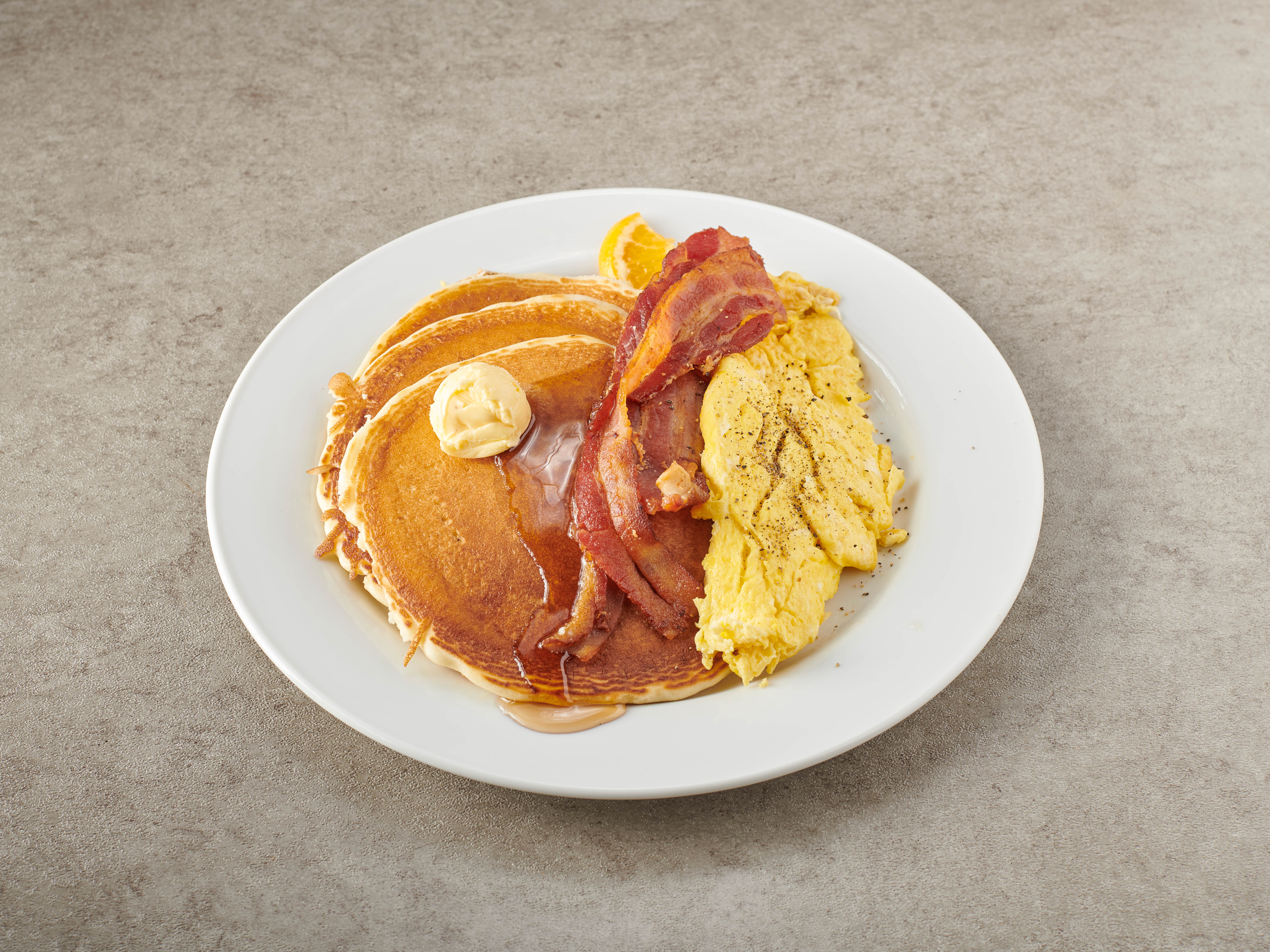 Order Pancakes Deluxe food online from Delight diner store, Ridgewood on bringmethat.com