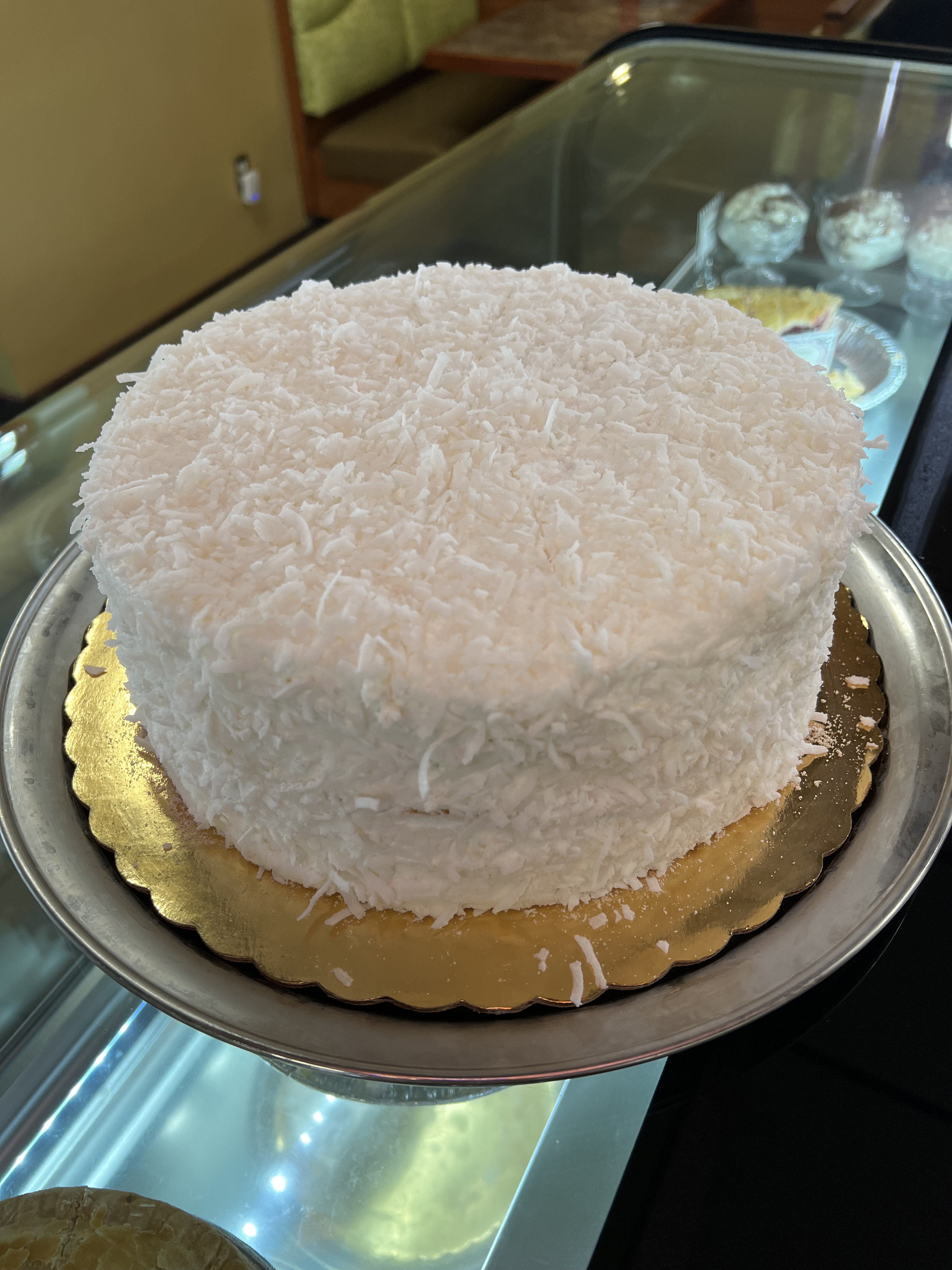 Order Coconut white Cake food online from Eastridge Family Restaurant store, Rochester on bringmethat.com