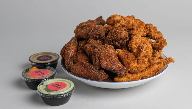 Order 30 wings or tenders with 3 dipping sauces food online from Fedwings store, Washington on bringmethat.com