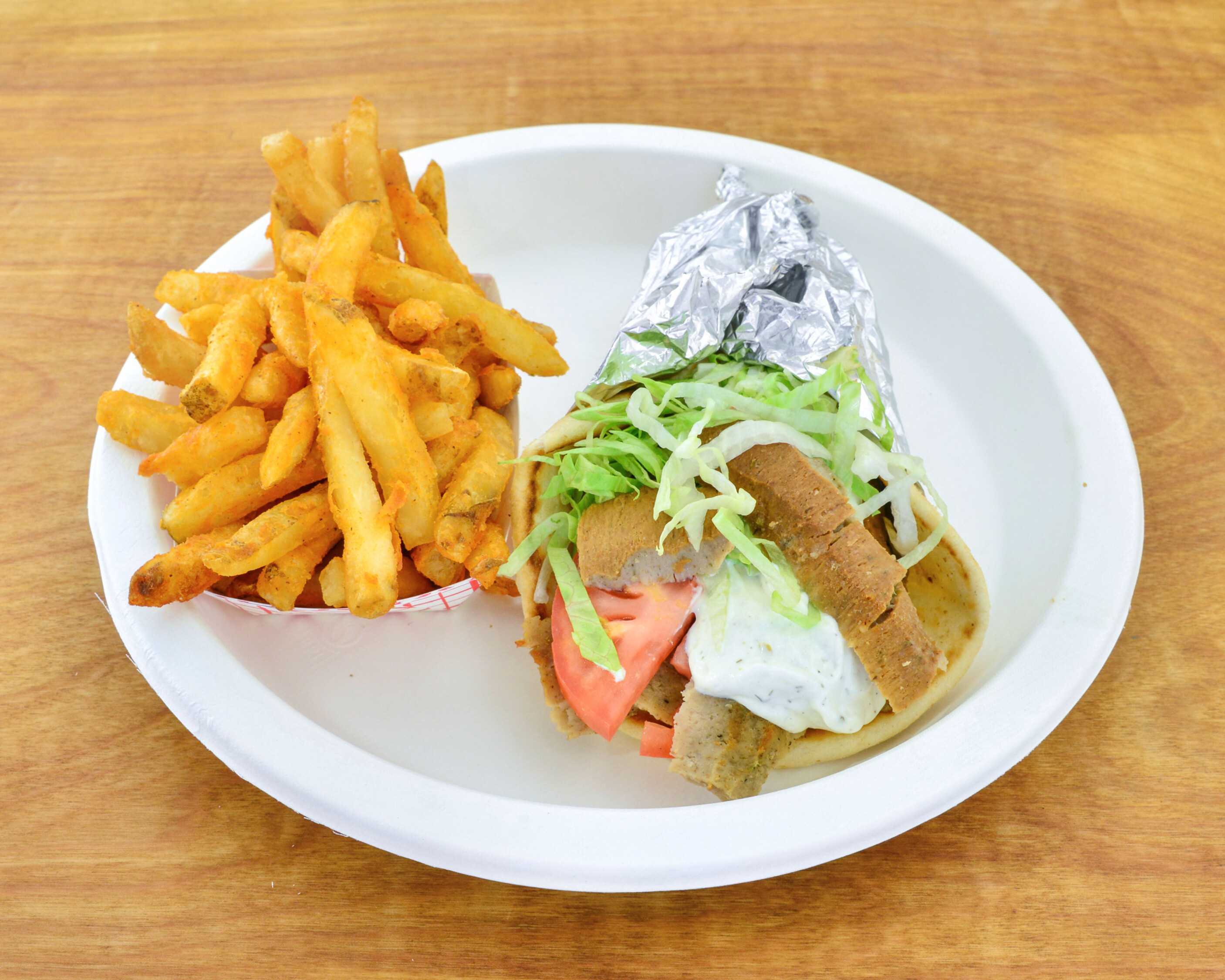 Order Gyro and Fries Combo food online from Mykonos Gyros store, Columbus on bringmethat.com