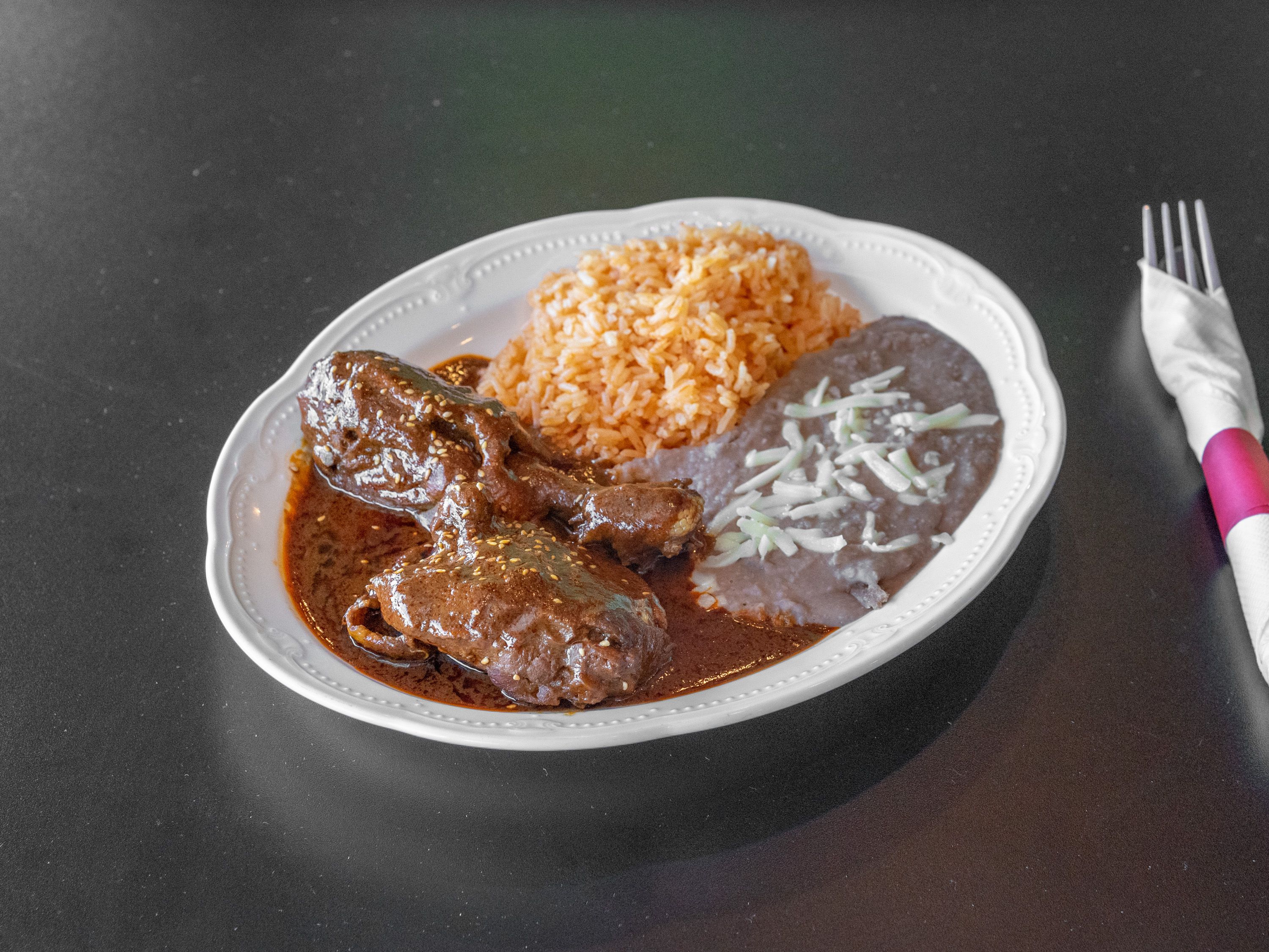 Order Mole Poblano food online from Bugambilias store, Indianapolis on bringmethat.com