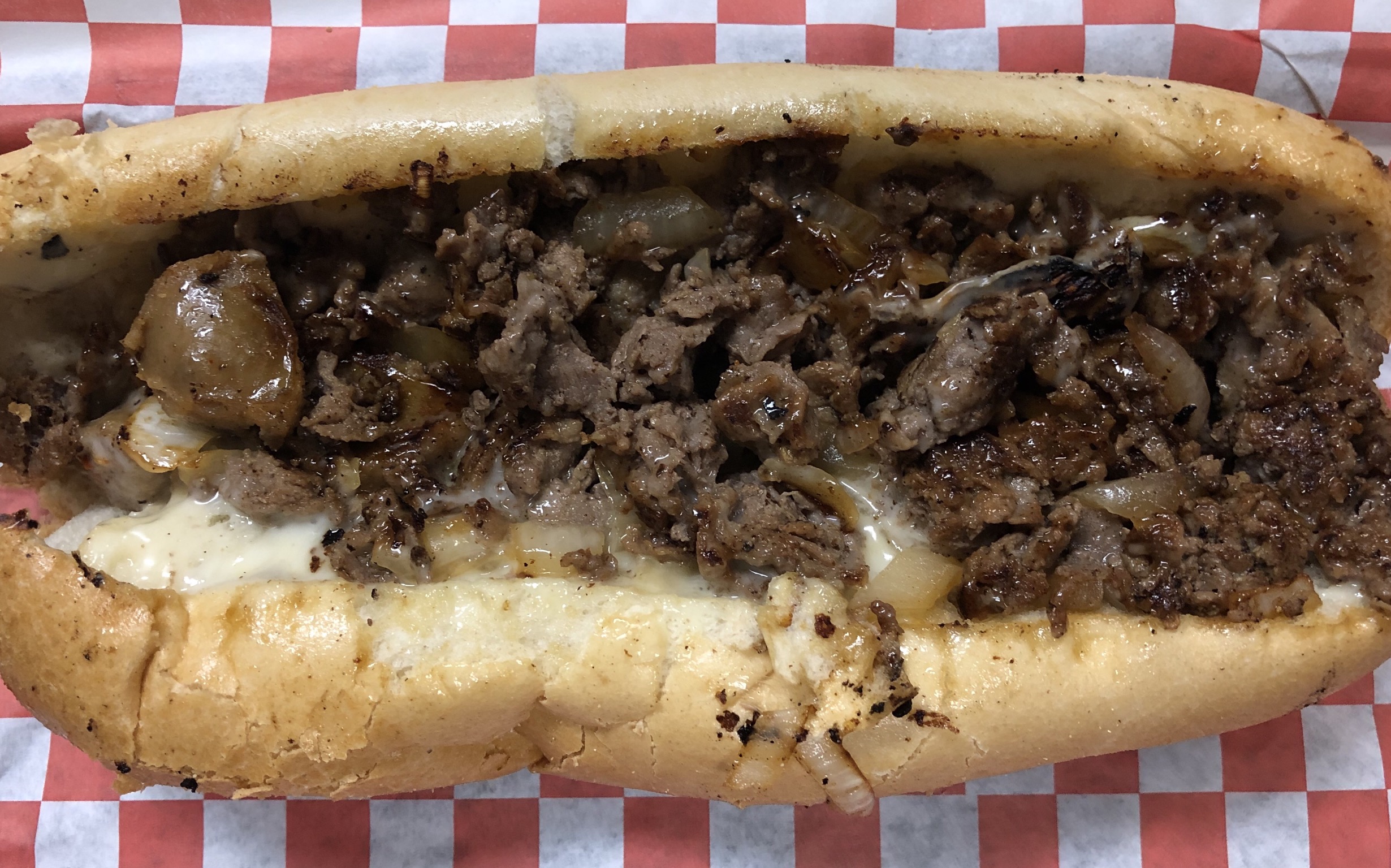 Order 18. Que Cheesesteak food online from Big Tony's West Philly Cheesesteaks store, Dallas on bringmethat.com