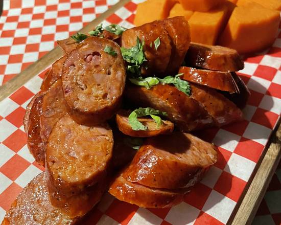 Order Smoked Cajun Andouille Sausage Plate food online from Memphis Minnies store, San Francisco on bringmethat.com