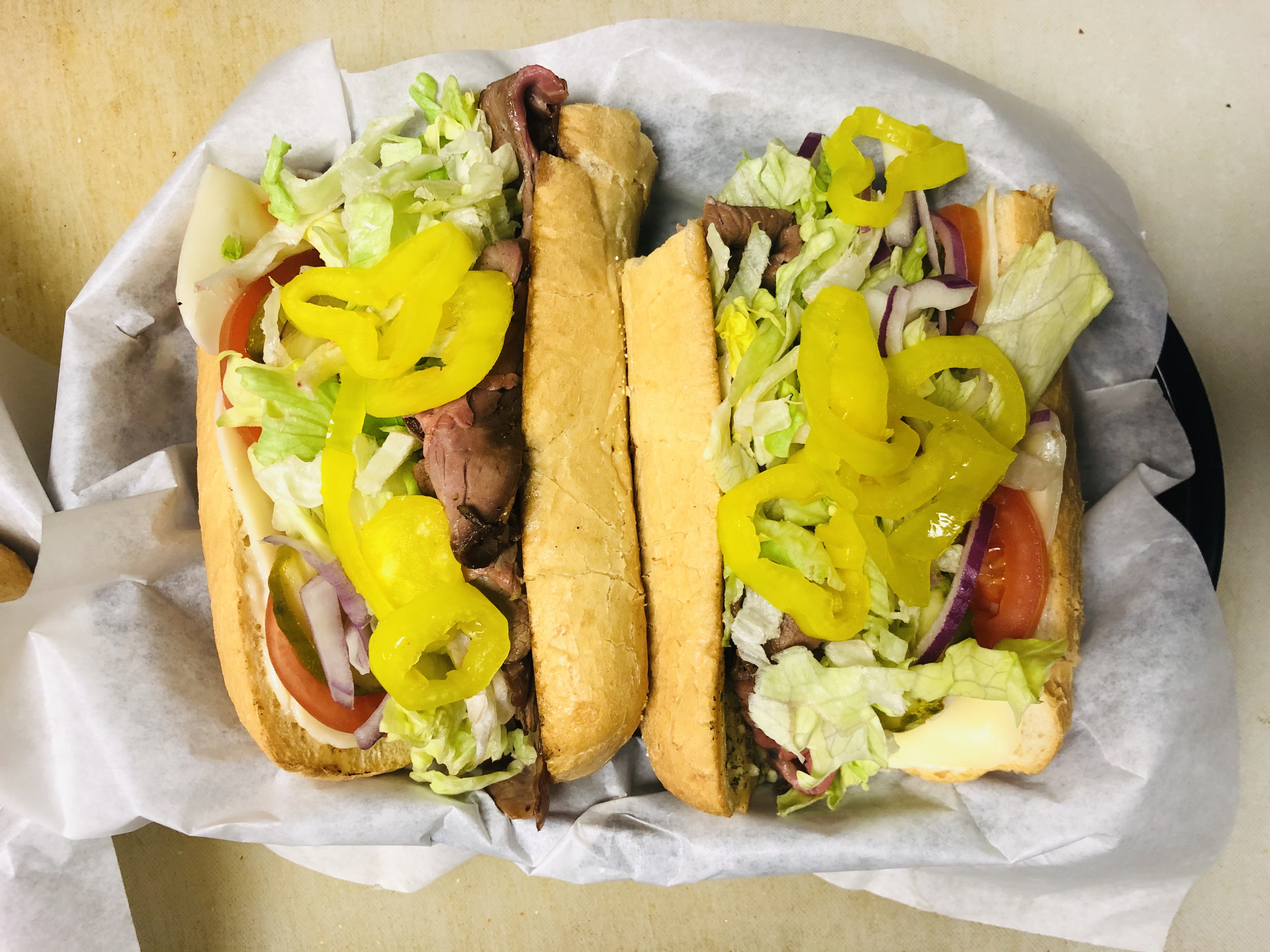 Order Godfather Sub food online from Omni Deli store, Ontario on bringmethat.com
